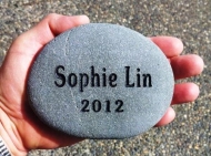 Hand sized stone engraved with the grandchild's name