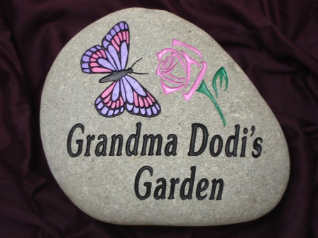 Grandma Dottie's garden stone pink rose in a pink butterfly