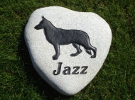 The German Shepherd Jazz on a heart shaped River rock