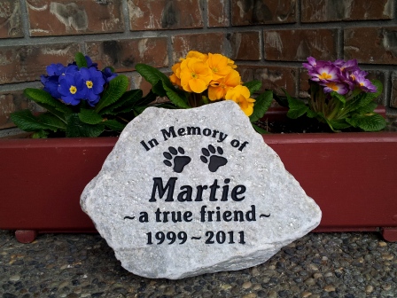 To paws engraved in stone for Marty